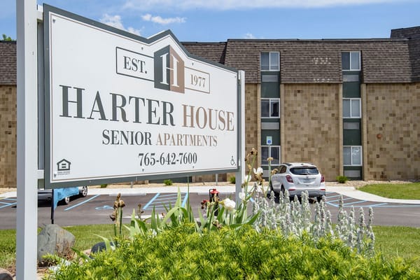 Exterior view of Harter House senior apartments sign.