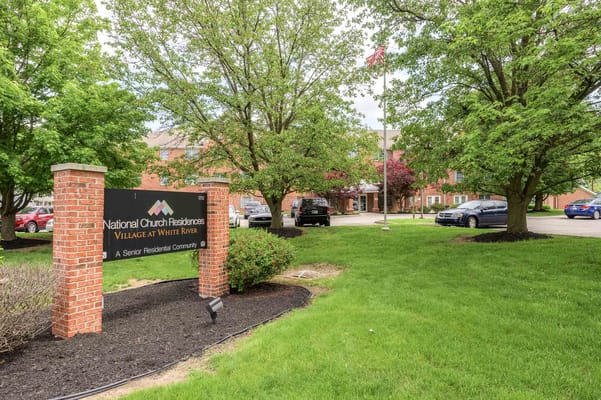 Sign displaying Village at White River senior living facility