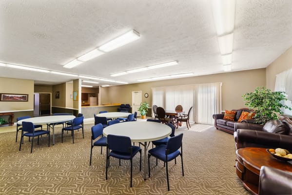 Bright common area with tables and seating