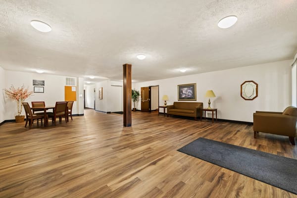 Interior view of a common area with seating and tables