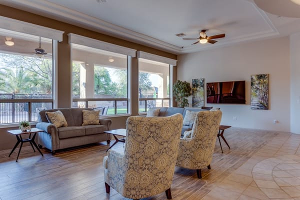 Common area with seating and large windows