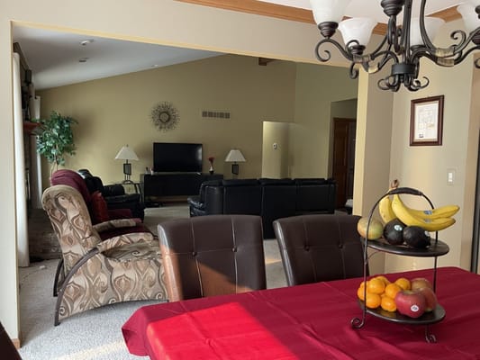 Dining area with fruit display and seating