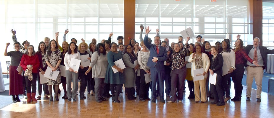 Group of staff celebrating in a common area
