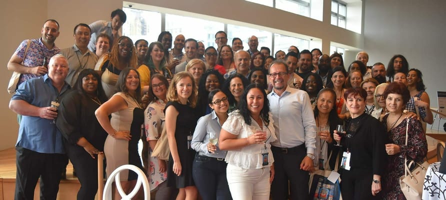 Group photo of staff members celebrating an event