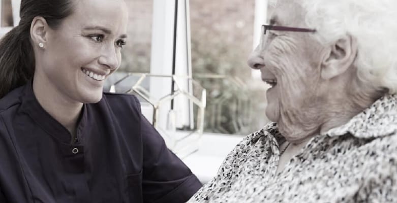 Staff member interacting with a resident