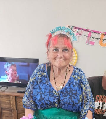Resident celebrating with festive attire and decorations