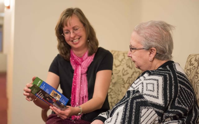 Staff member engaging with a resident