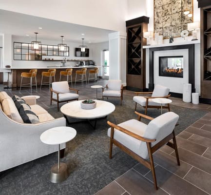 Inviting common area with seating and fireplace