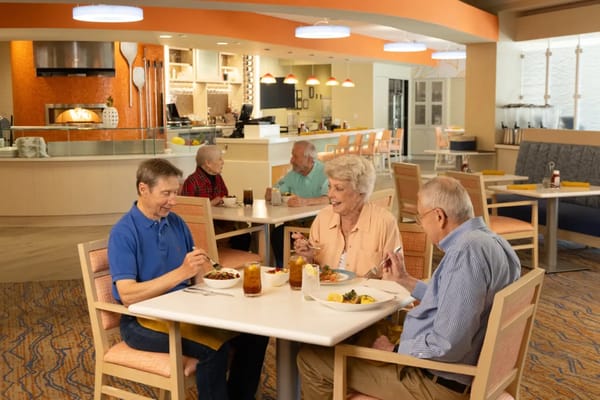 Residents enjoying lunch in a dining area