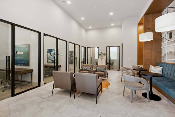 Bright common area with seating and decor