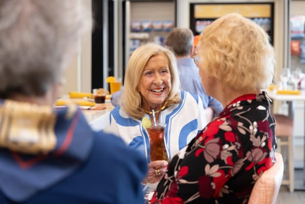 Residents enjoying conversation in a common area