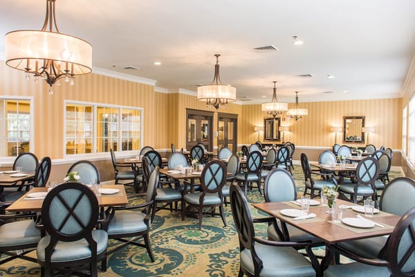 Bright dining room with elegant tables and chairs