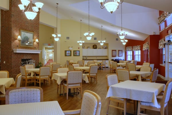 Bright dining area with tables and chairs