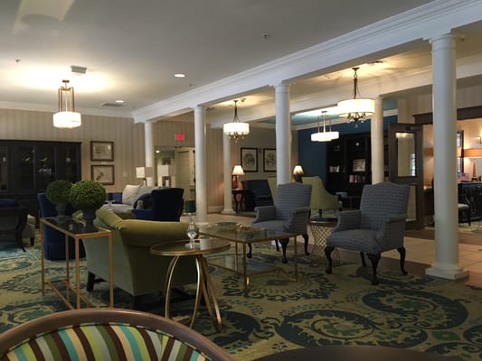 Bright common area with comfortable seating and decor