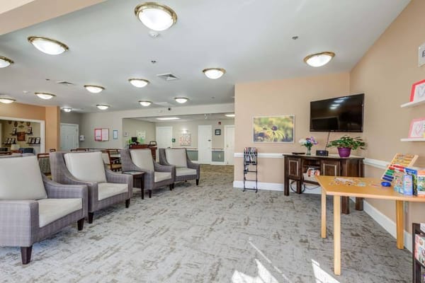 Common area with seating and a television