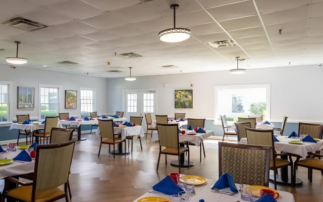 Dining room set for a meal in a bright space