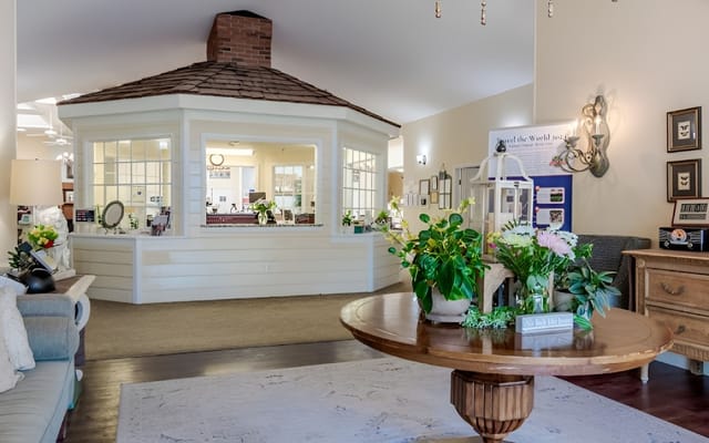 Welcoming interior common area with floral arrangements