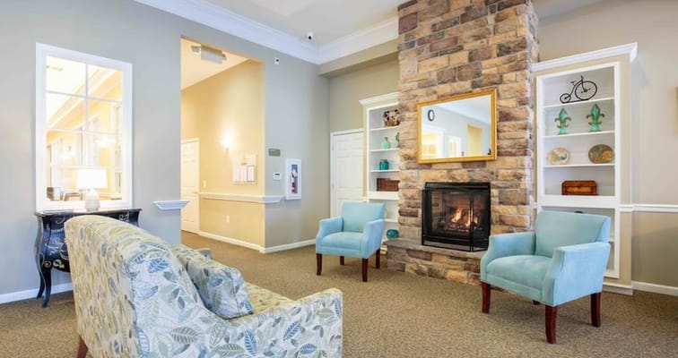 Cozy common area with seating and fireplace