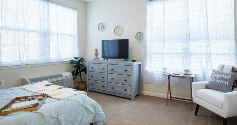 Bright and cozy resident room with natural light