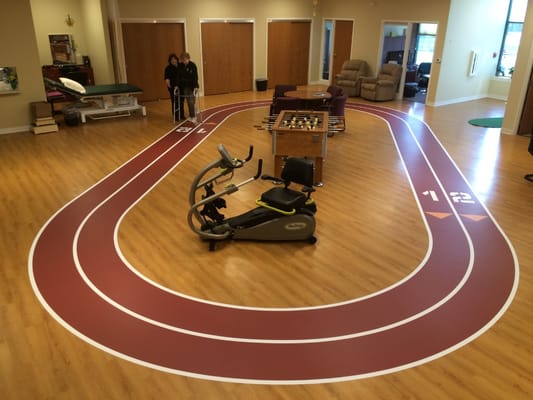 Residents engaging in activity in a fitness space