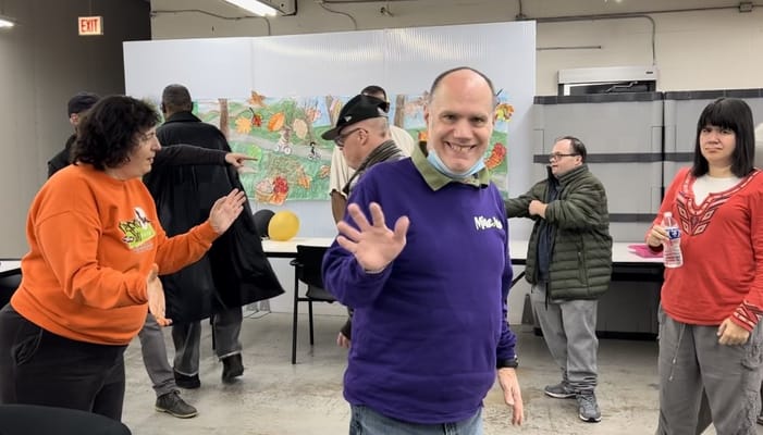 Participants enjoying activities in the activity room at Shore Community Services.
