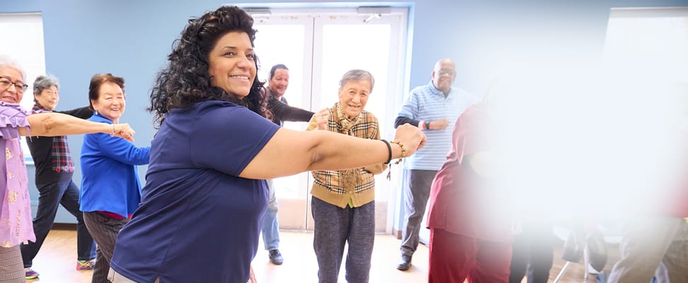 Residents participating in a group exercise class