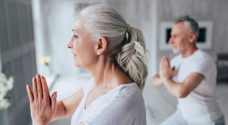 Residents participating in a yoga class indoors