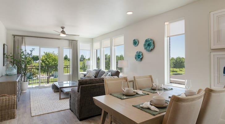 Bright common area with modern furnishings and outdoor view