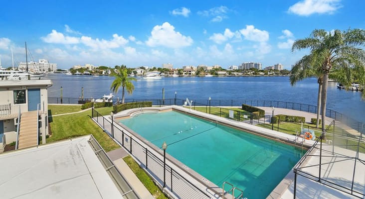 Swimming pool overlooking the water at Gateway Terrace Senior Apartments.