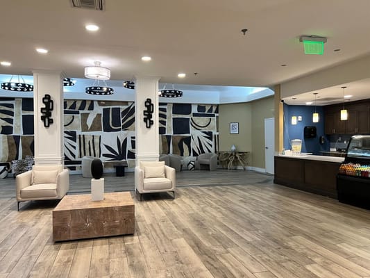 Spacious common area with modern decor and seating