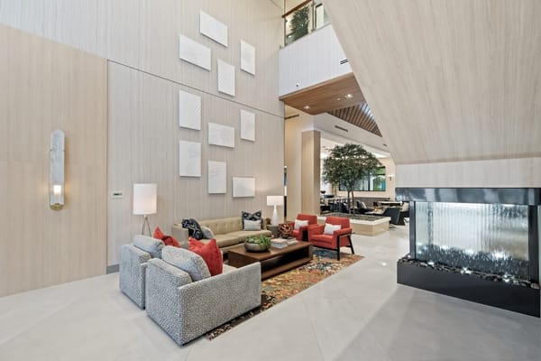 Modern lobby with seating and decorative wall art