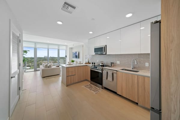 Modern kitchen interior with open living area