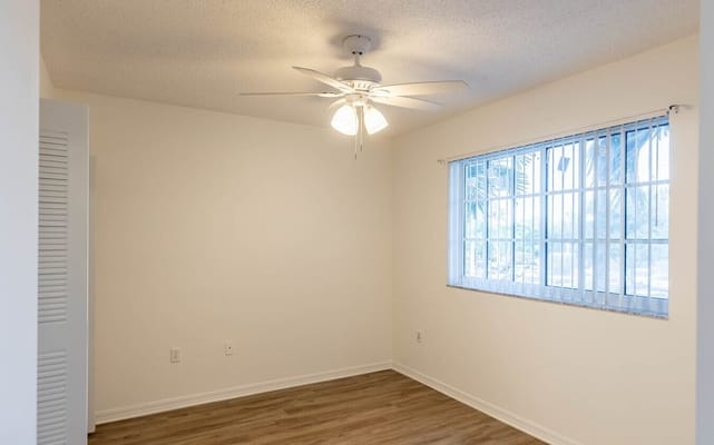 Bright, empty resident room with a window