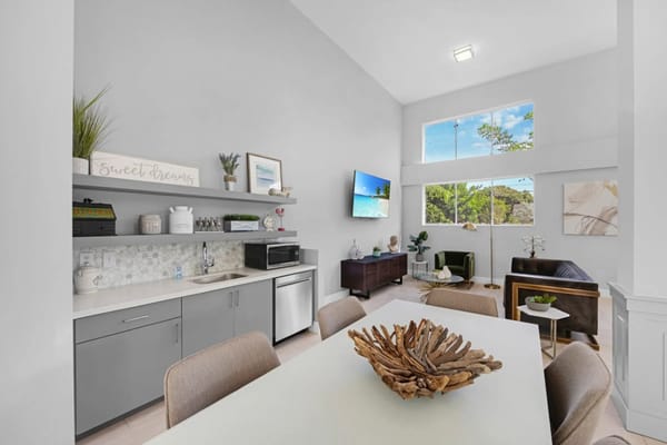 Bright common area with modern decor and windows