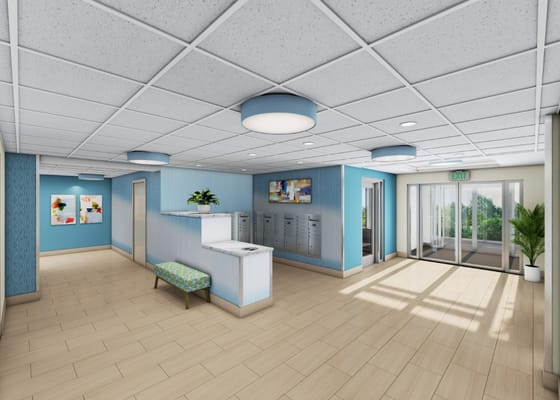 Bright and modern lobby with reception area and seating