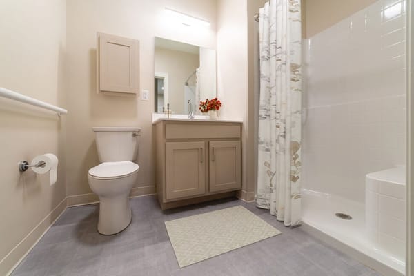 Bright and modern bathroom in a resident's unit