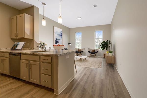 Bright common area with seating and natural light.