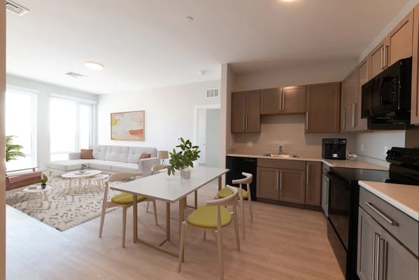 Modern kitchen and living area in a senior living facility