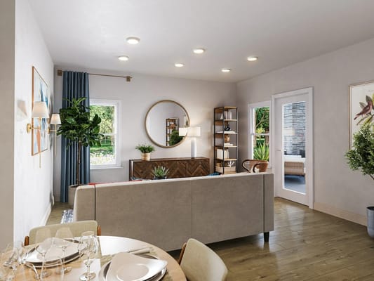 Bright living room with contemporary decor and access to outdoor space.