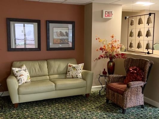 Cozy common area with a sofa and decorative accents