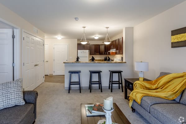 Bright, modern interior of a living space with kitchen