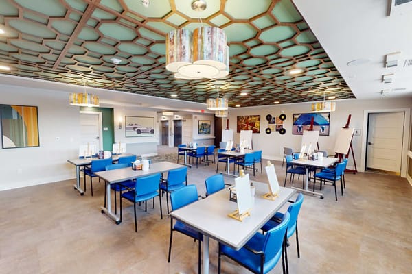 Bright dining area with modern decor and seating