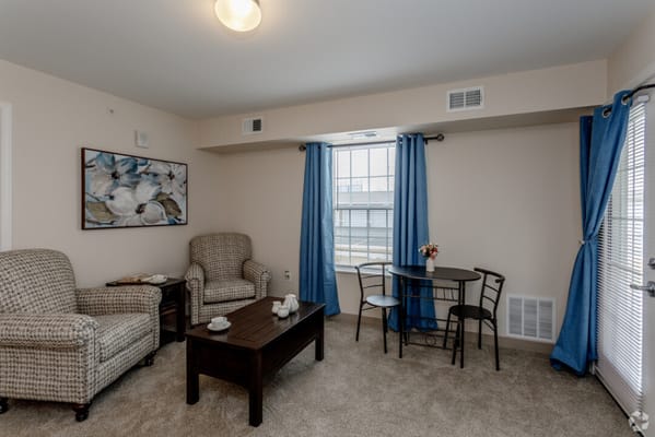 Cozy private resident room with furniture and decor