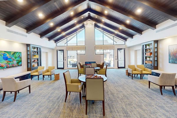Bright common area with seating and artwork