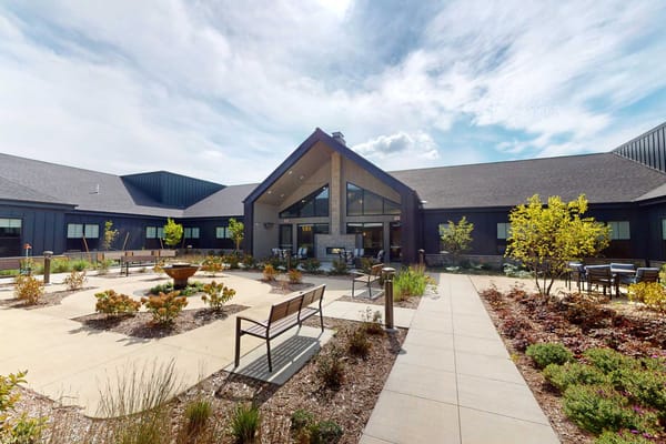 Exterior view of FeatherStone at Hickory Hill with gardens