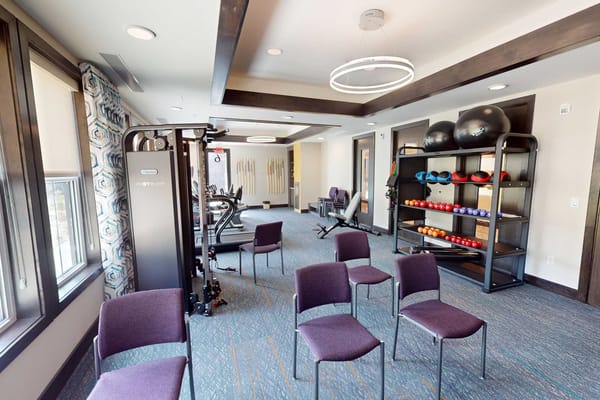 Interior view of a fitness room with exercise equipment