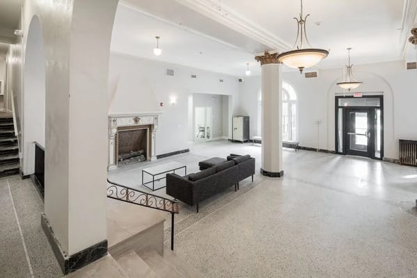 Interior view of a spacious lobby with seating