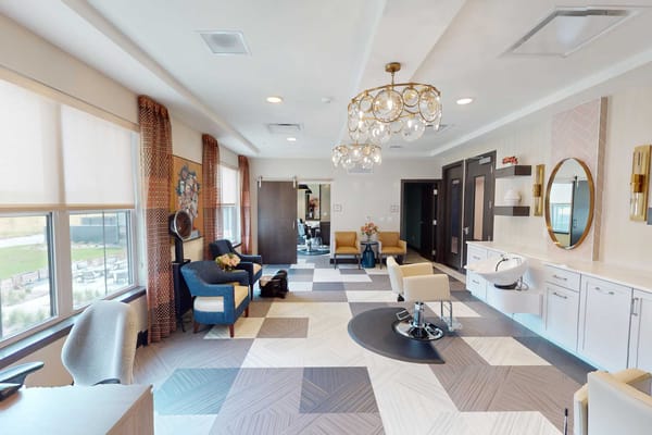 Bright interior common area with seating and decor