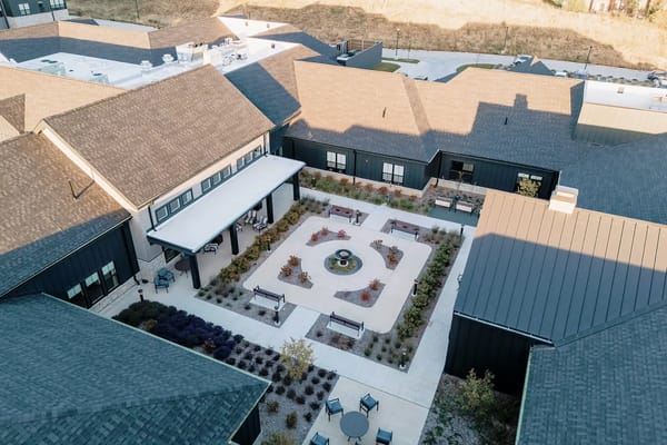Aerial view of the courtyard with seating areas and landscaping