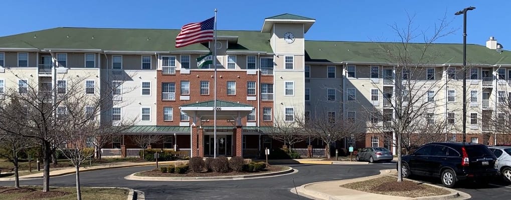Exterior view of Churchill Senior Living facility on a clear day